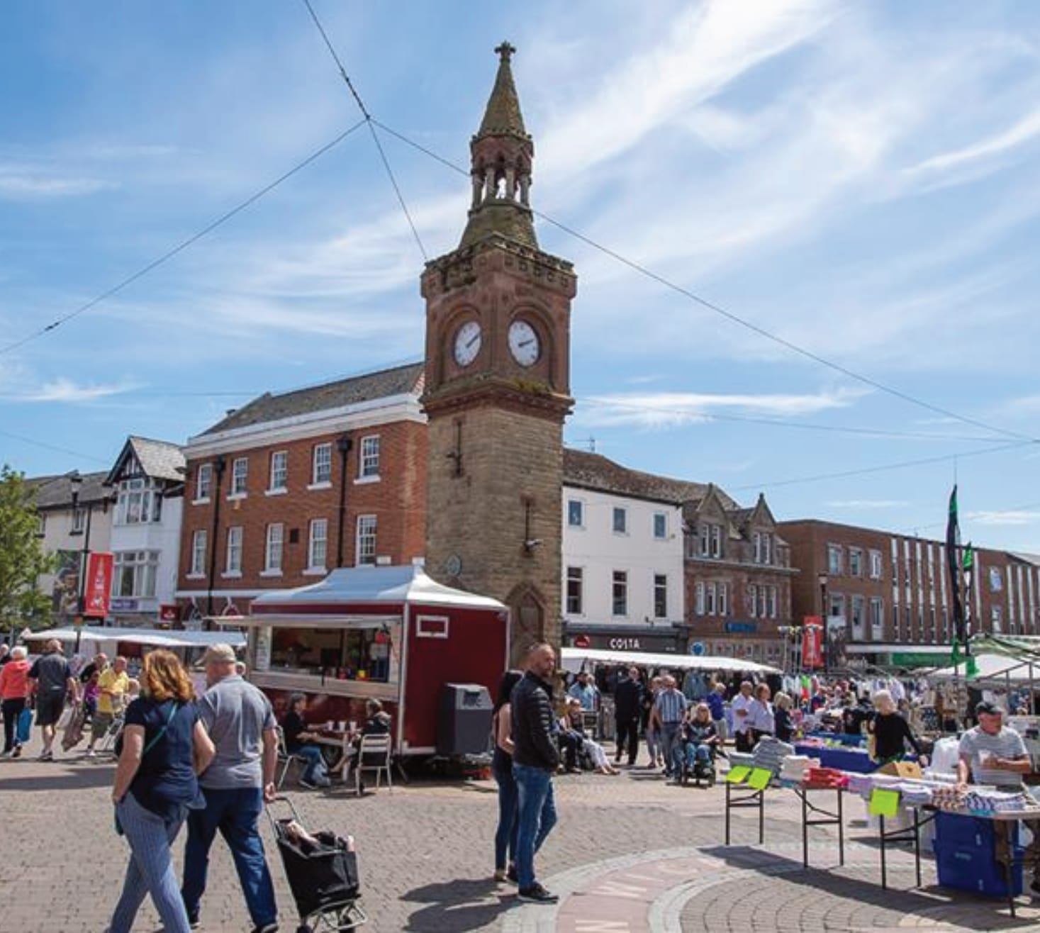 A bustling scene in Ormskirk town centre featuring the iconic Clock Tower, a well-known local landmark. Surrounded by historic architecture, a vibrant market is in full swing, with visitors enjoying the lively atmosphere. This charming snapshot of Ormskirk reflects the town’s rich heritage and community spirit. Mastercraft Kitchens, located in Ormskirk, is proud to be part of this thriving community, offering bespoke kitchen designs crafted with the same attention to detail and timeless quality that the town embodies.